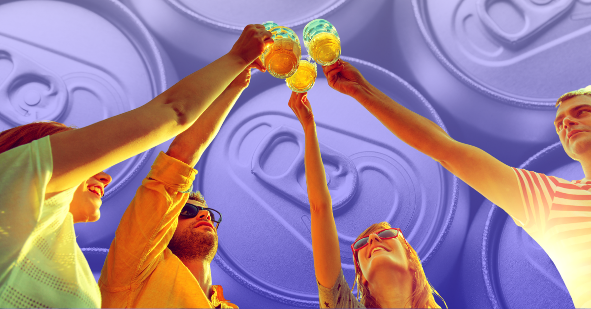 Group of friends toasting with yellow beverages against a purple background with can imprints